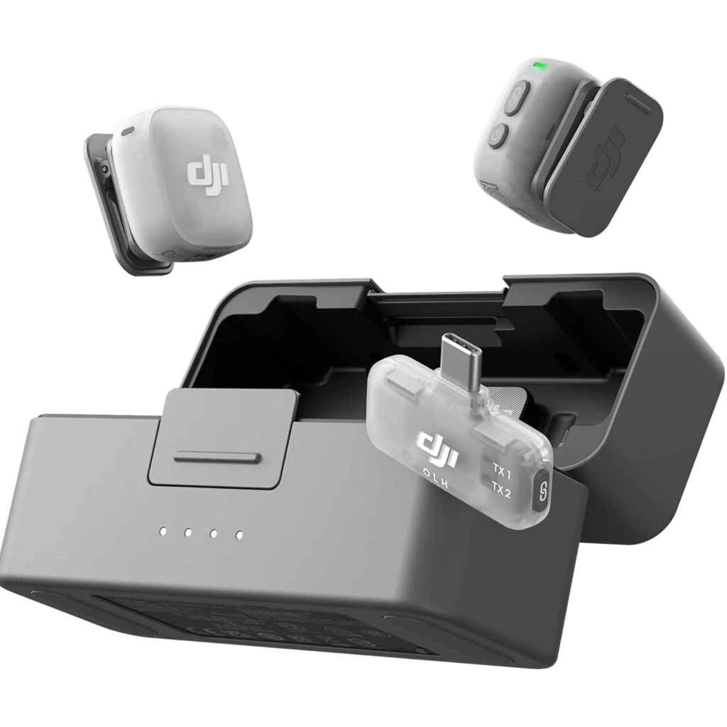 DJI Mic Mini 2 con estuche de carga gris, dos transmisores compactos con clip y LED, y receptor USB-C transparente etiquetado TX1 TX2 S