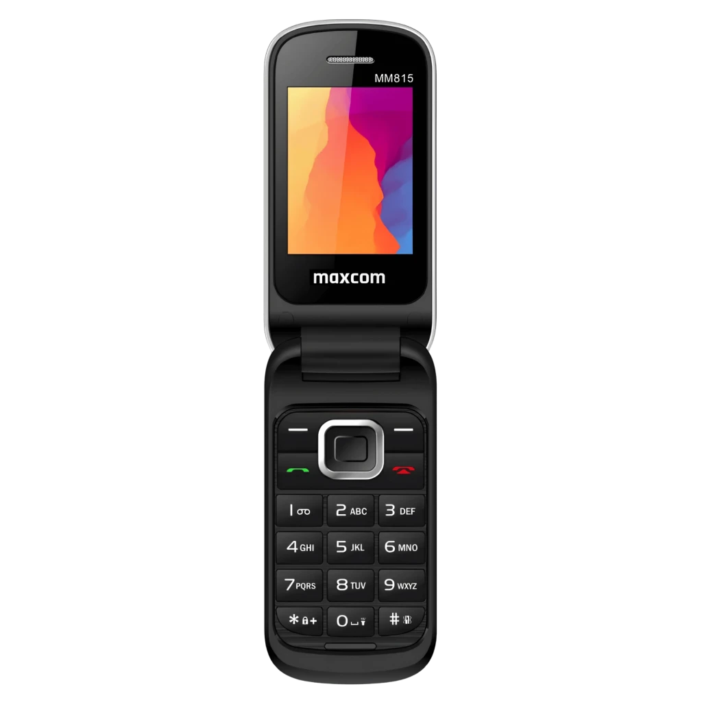 Maxcom Comfort MM815 gris con tapa tipo concha, pantalla 2.4 a color, teclado grande con números claros, tecla central, botón SOS y diseño compacto Dual SIM