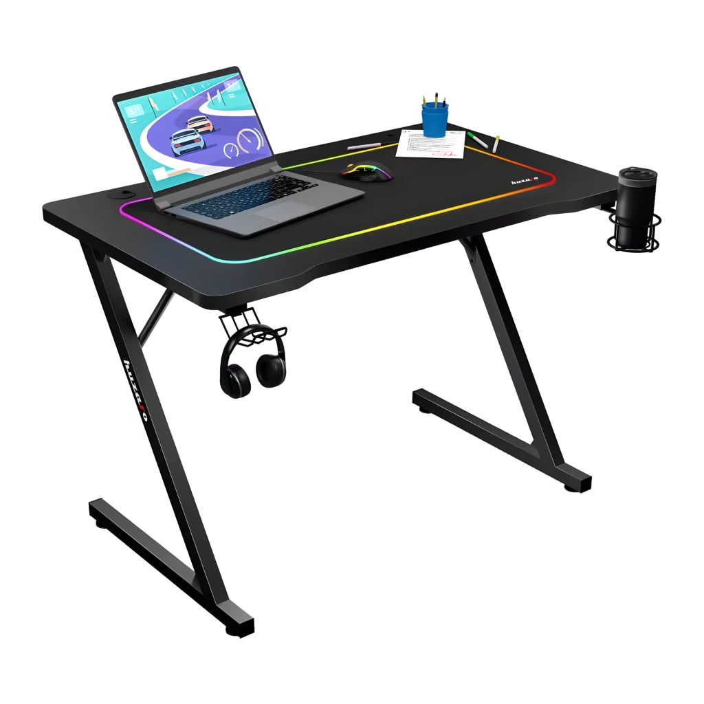 Huzaro Mesa gaming Hero 1.8 Negro, vista en perspectiva: iluminación RGB en borde, patas en Z, portátil, ratón, auriculares